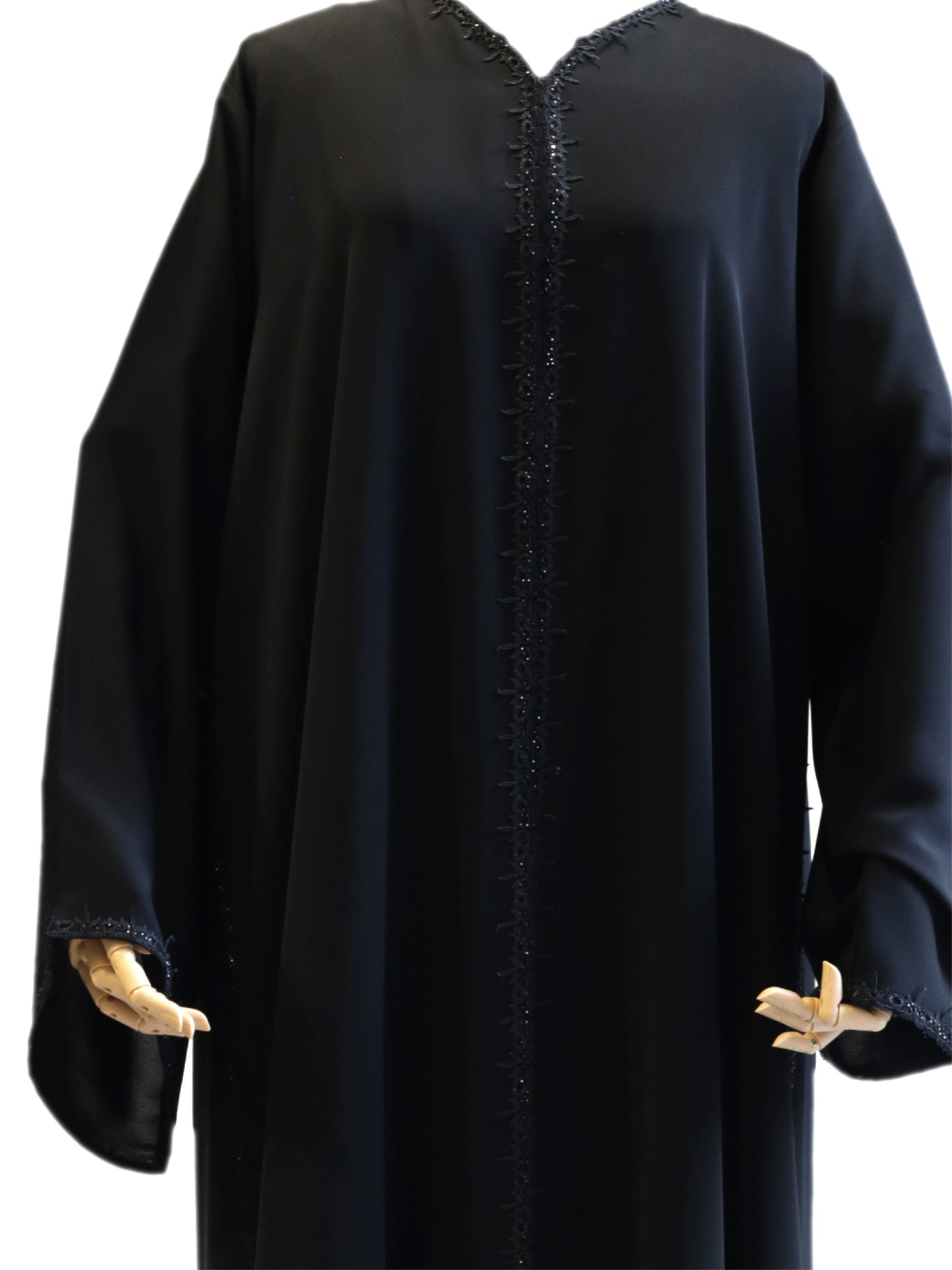 Experience Timeless Elegance with Our Stone Curved Lace Black Abaya: A Perfect Blend of Sophistication and Style